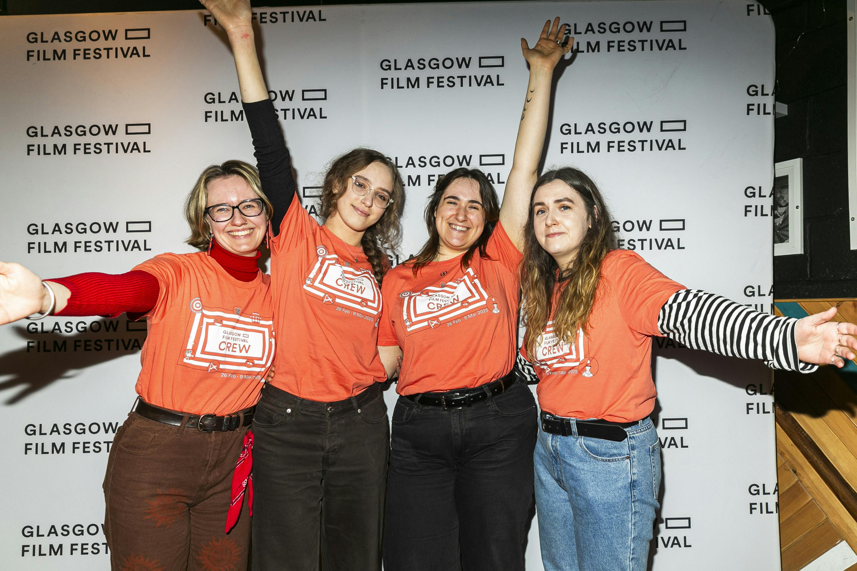 Audience award team celebrating with signs