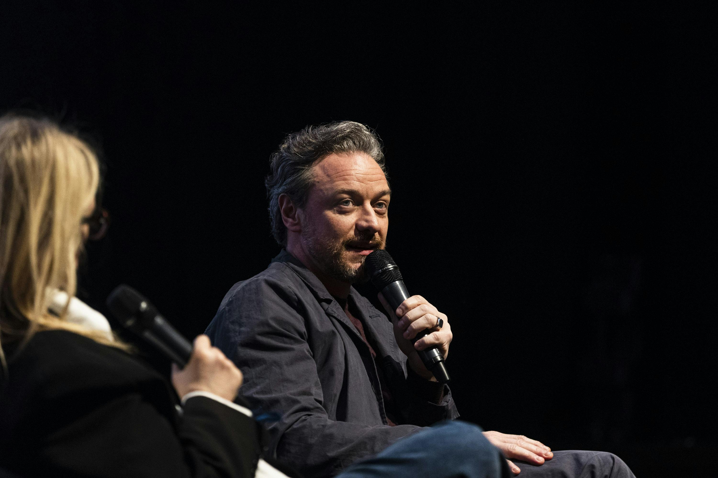 James McAvoy speaking on stage at Glasgow Film Festival