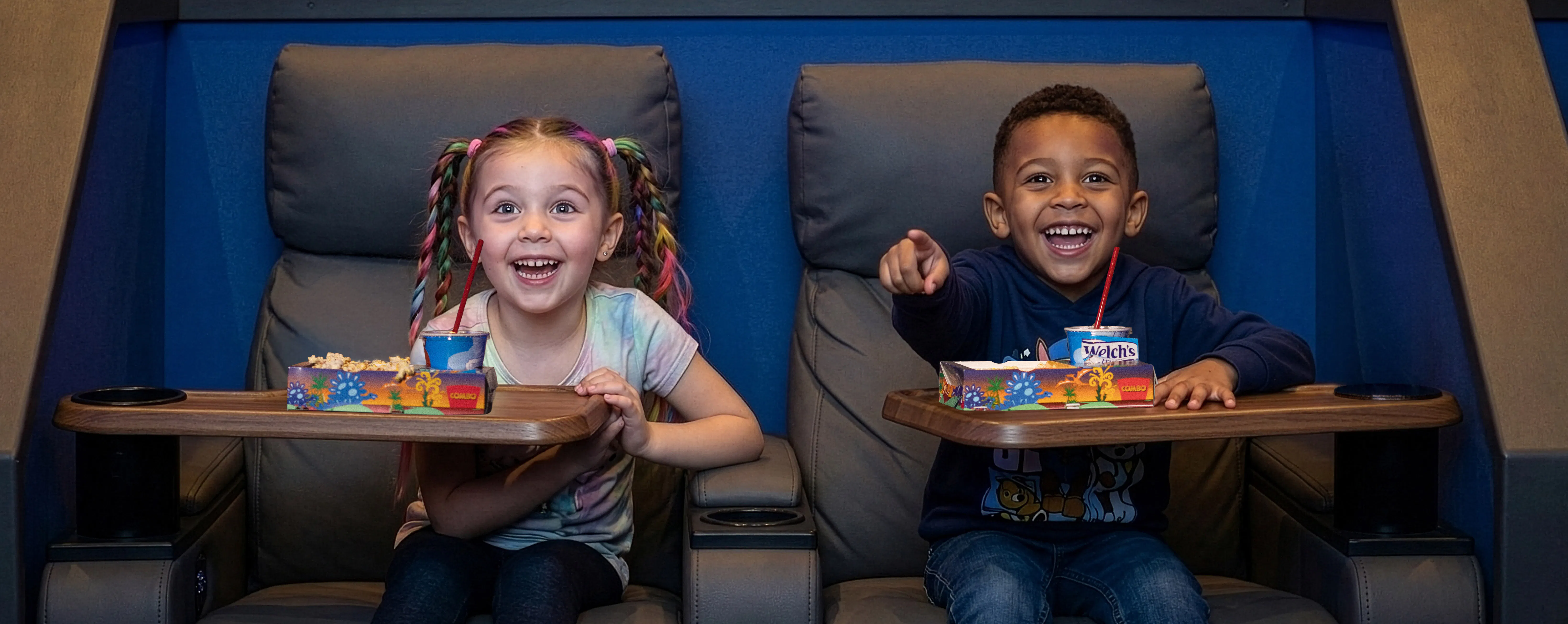 Children enjoying a sensory-friendly movie screening at Paragon Theaters