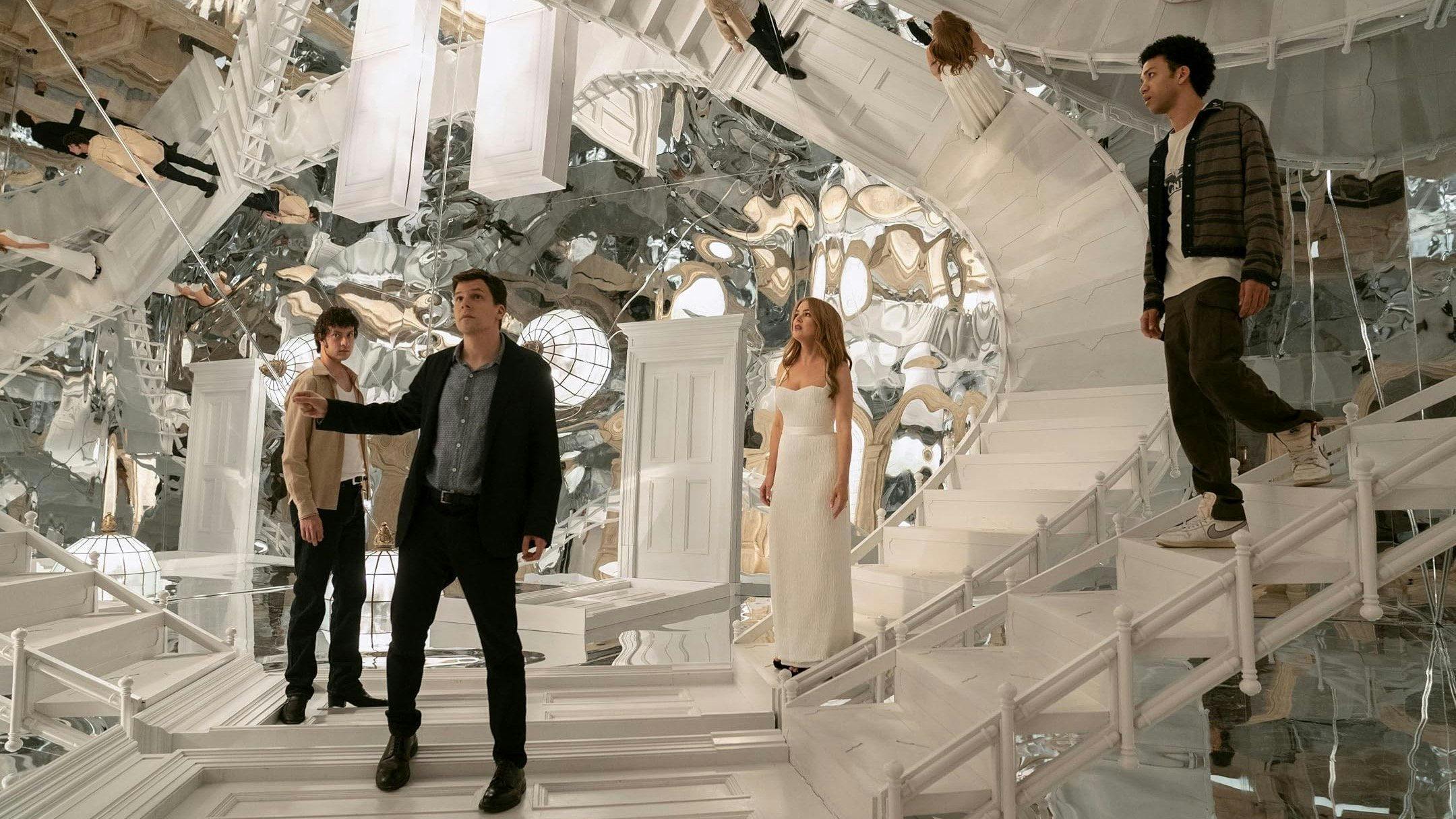 Two friends chasing floating legs in a red room from House, 1977