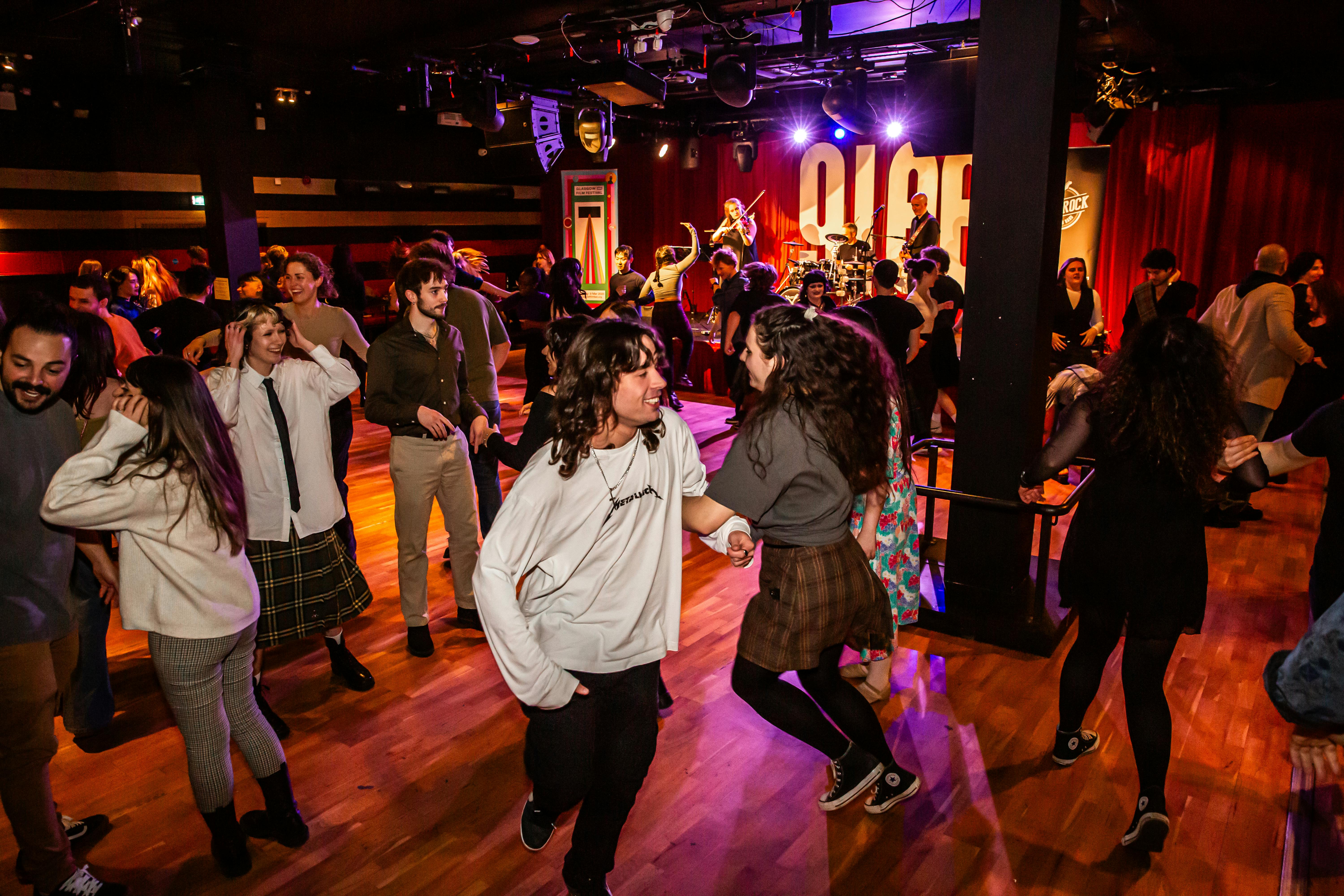 Guests dancing at a Glasgow Film Festival party