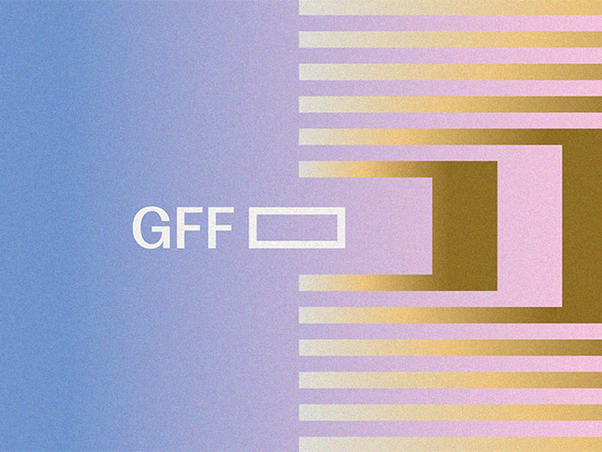 Volunteers wearing red GFF CREW shirts at an event