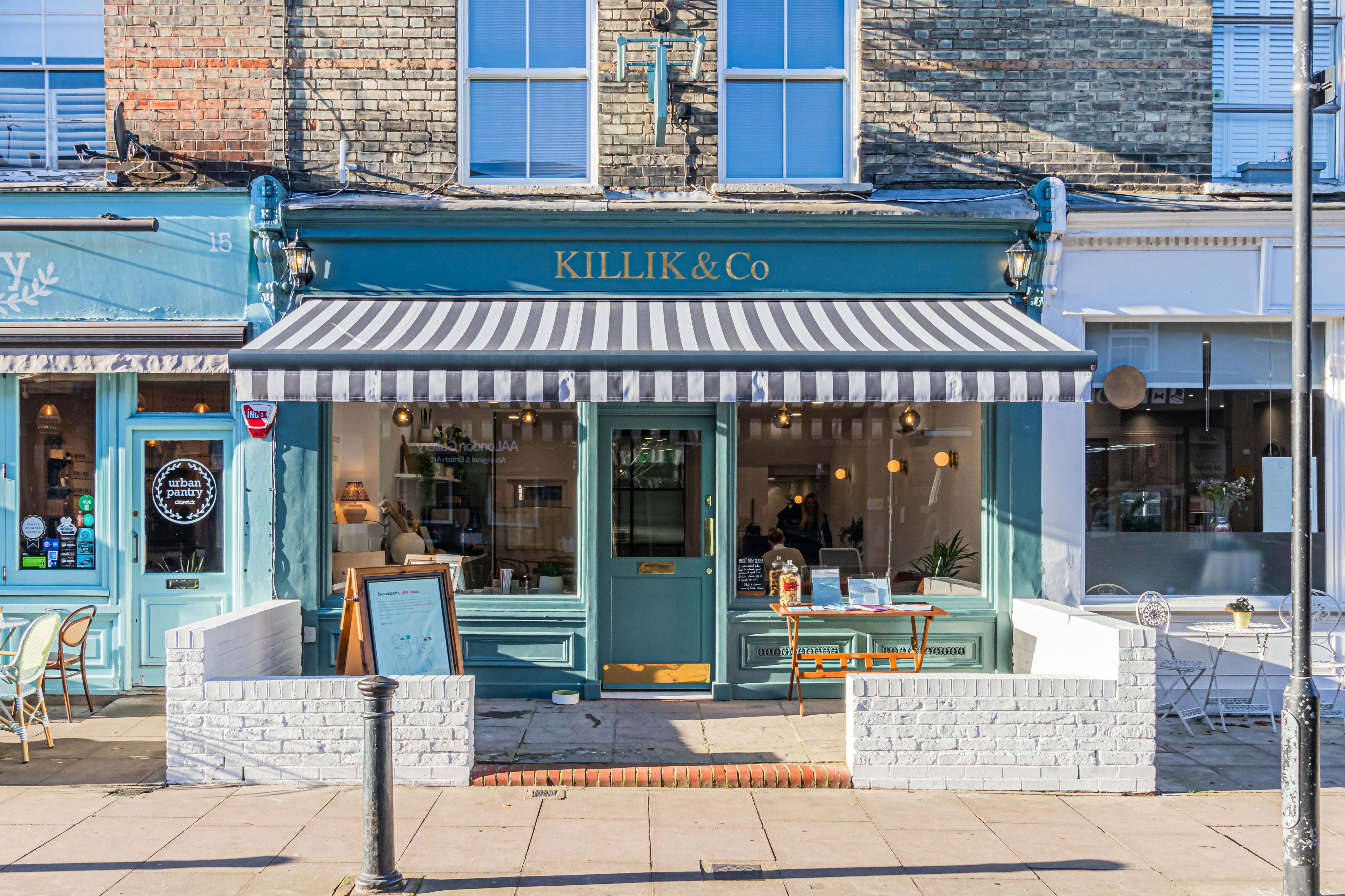 The exterior of Killik & Co's vibrant blue showroom in West London.