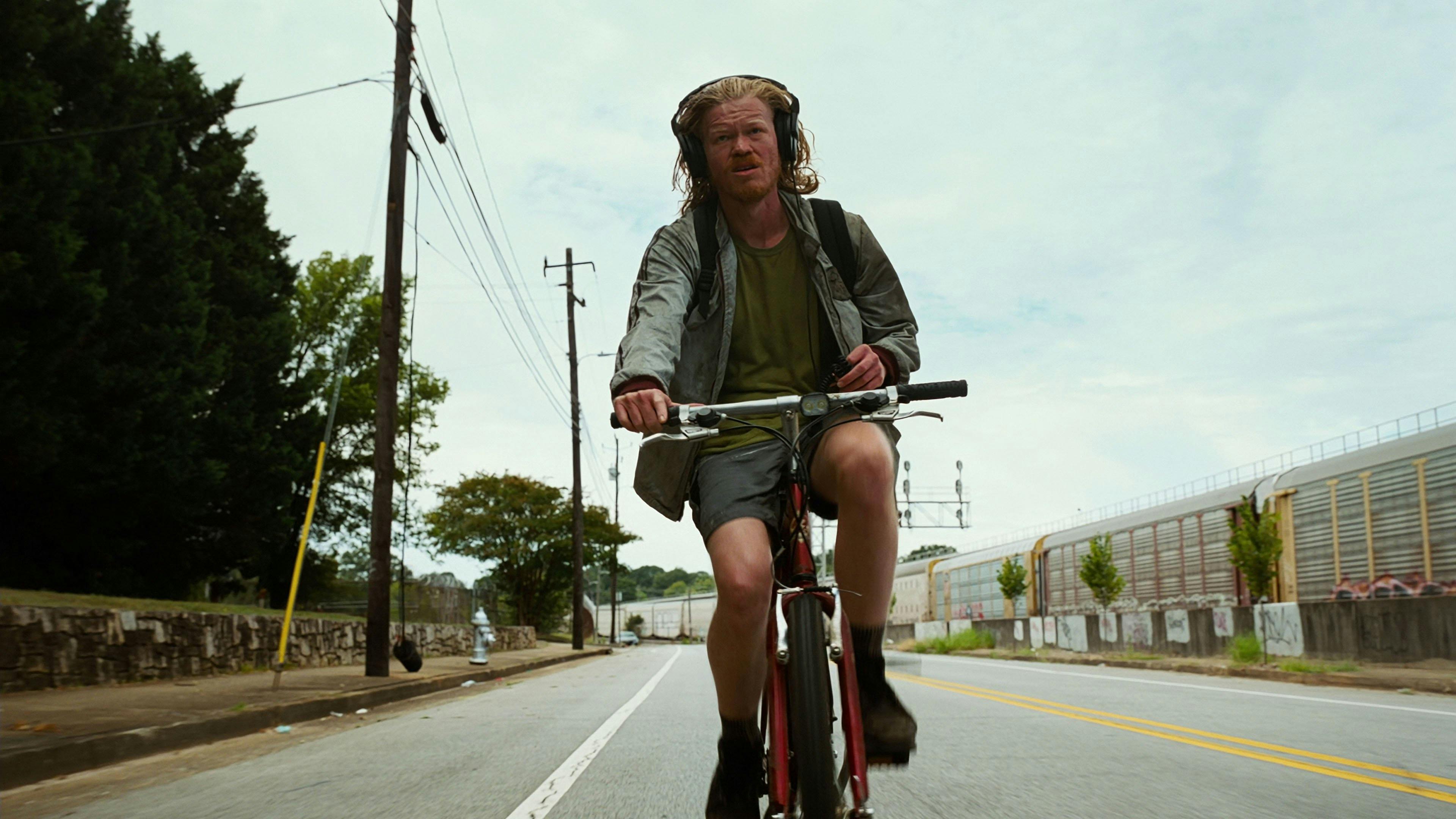 A young woman holding a severed head in House, 1977