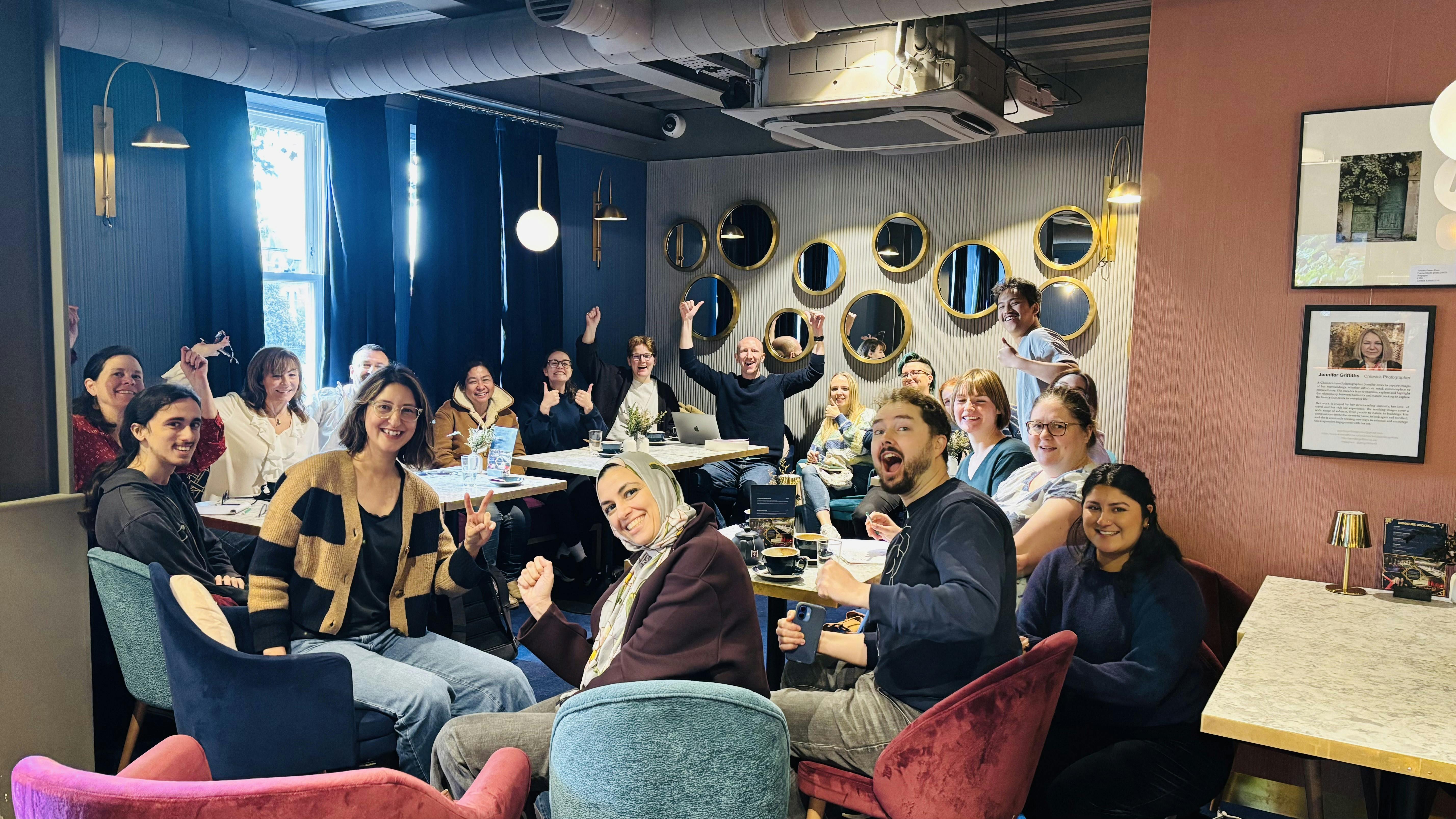 Guests network and talk in the cinema Lounge bar over a coffee.