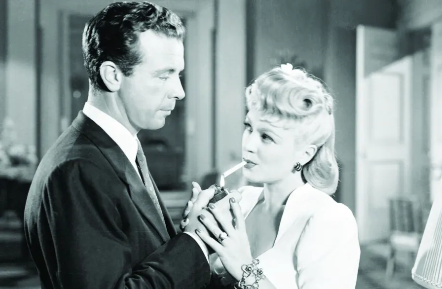 Friends enjoying popcorn at cinema