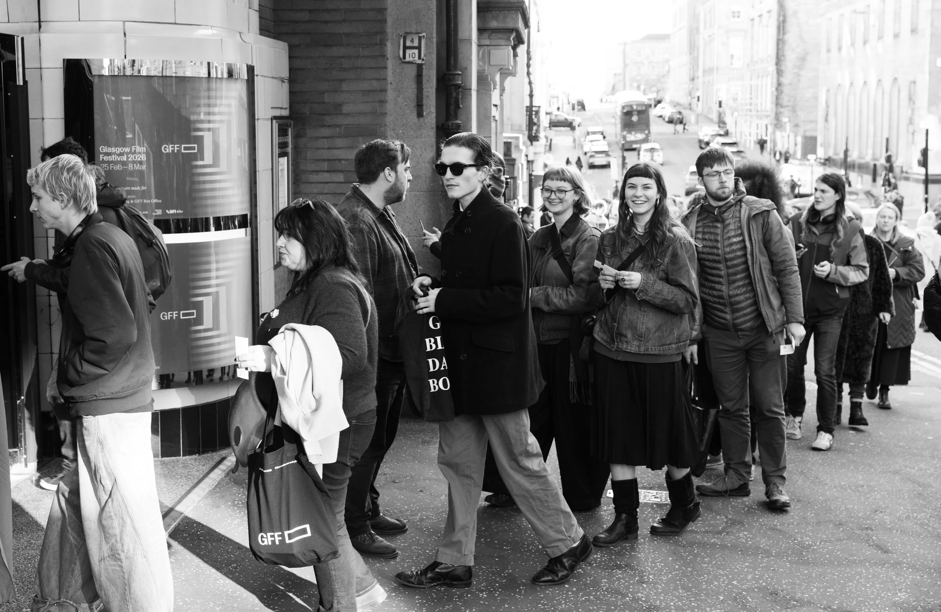 The festival audience queuing outside the GFT for the Premiere of Super Nature. Photography by Amy Muir.