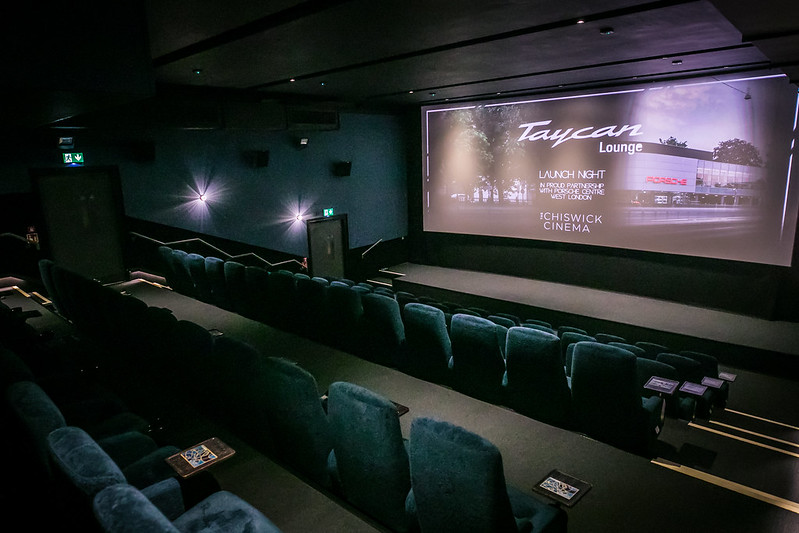 The cinema's screen 2 auditorium with blue seats and a large stage.