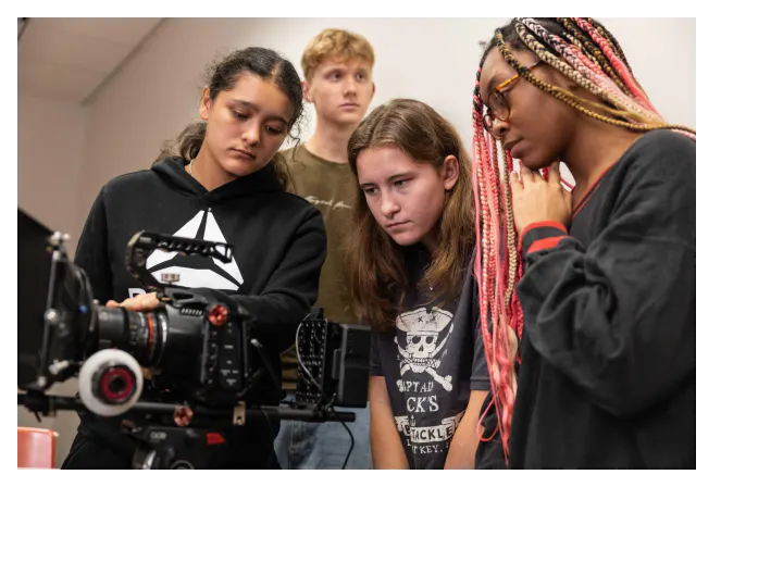 Young filmmakers learning camera production